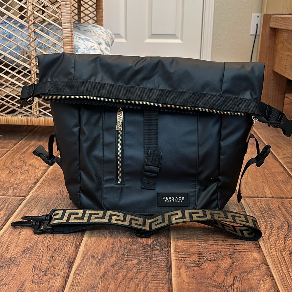 Black Versace perfumes backpack